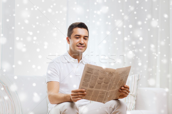 Heureux homme lecture journal maison loisirs [[stock_photo]] © dolgachov