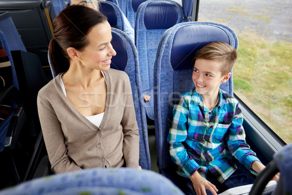 happy family riding in travel bus Stock photo © dolgachov