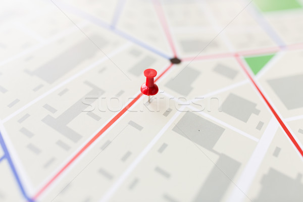close up of map or city plan with pin Stock photo © dolgachov