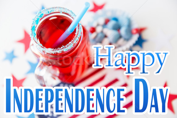 juice glass and american flag on independence day Stock photo © dolgachov