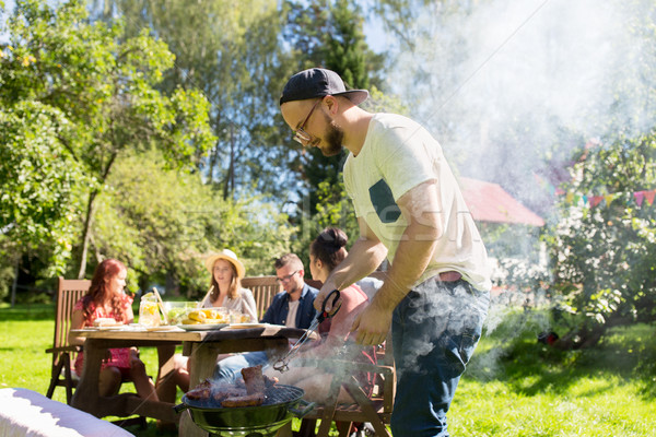 Stockfoto: Man · koken · vlees · barbecue · zomer · partij