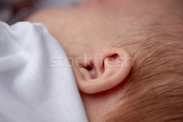 close up of baby ear Stock photo © dolgachov
