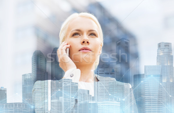 Ernstig zakenvrouw smartphone stad business technologie Stockfoto © dolgachov