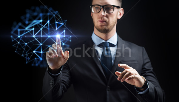 close up of businessman with network projection Stock photo © dolgachov