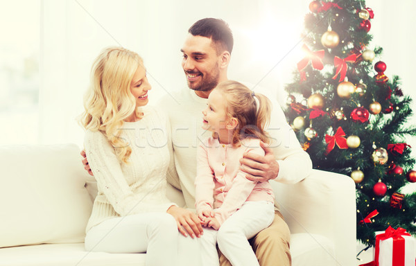 happy family at home with christmas tree Stock photo © dolgachov