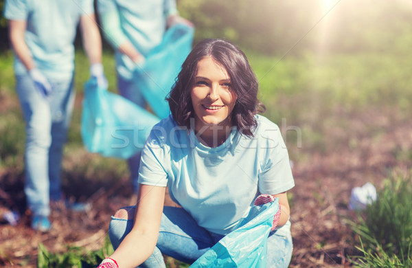 Foto stock: Voluntários · lixo · sacos · limpeza · parque · voluntariado