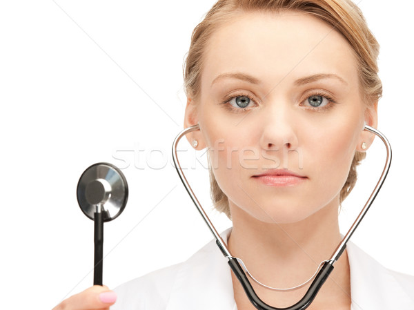 attractive female doctor with stethoscope Stock photo © dolgachov
