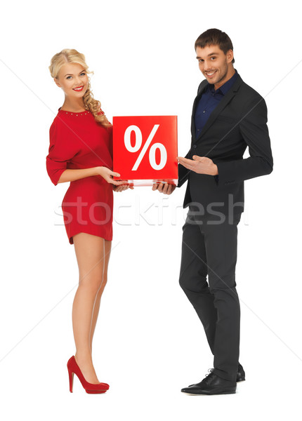 Stock photo: man and woman with percent sign