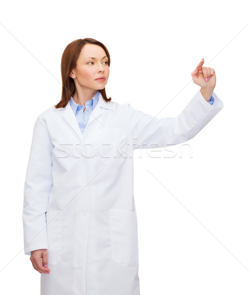 Orvos mutat valami kisajtolás gomb egészségügy Stock fotó © dolgachov