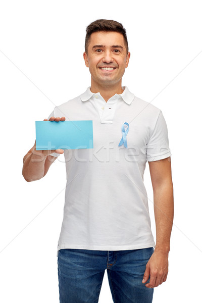 man with prostate cancer awareness ribbon and card Stock photo © dolgachov