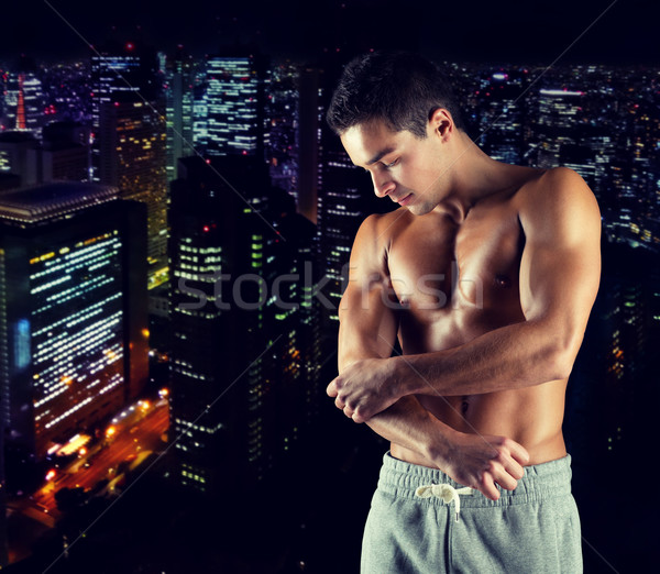 Stockfoto: Jonge · mannelijke · bodybuilder · gewond · aanraken · elleboog