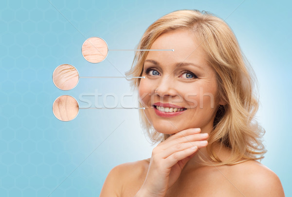 Mosolygó nő meztelen vállak megérint arc szépség Stock fotó © dolgachov