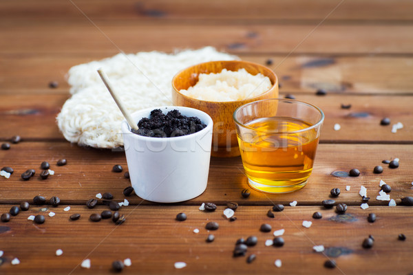 close up of coffee scrub in cup and honey on wood Stock photo © dolgachov