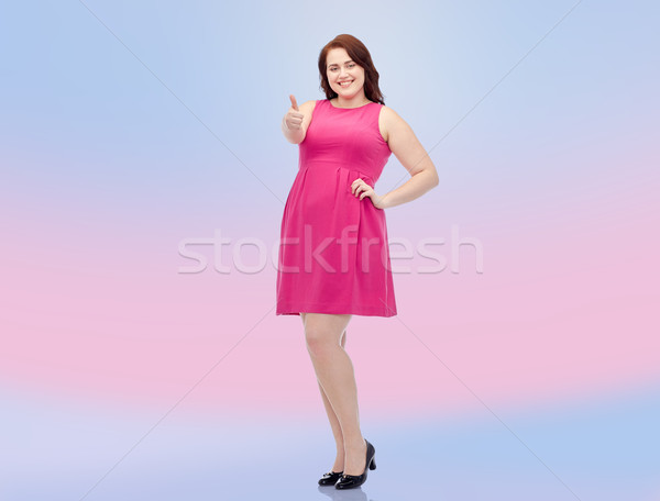 Boldog fiatal plus size nő mutat remek Stock fotó © dolgachov