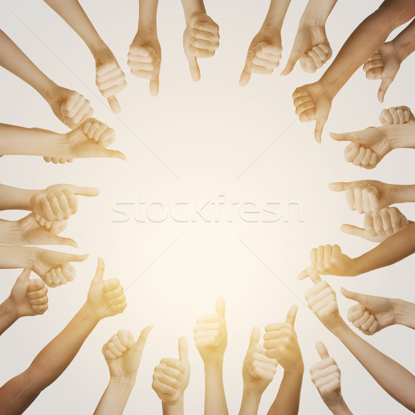 human hands showing thumbs up in circle Stock photo © dolgachov