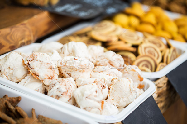 close up of meringue cookies on serving tray Stock photo © dolgachov