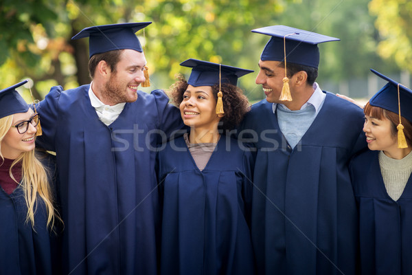 Foto stock: Feliz · estudantes · solteiros · educação · graduação · pessoas