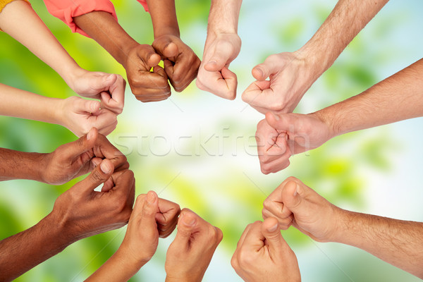 hands of international people showing thumbs up Stock photo © dolgachov