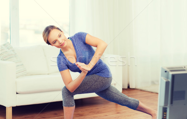 Nő készít jóga alulról fotózva póz fitnessz Stock fotó © dolgachov