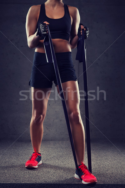 close up of woman with expander exercising in gym Stock photo © dolgachov