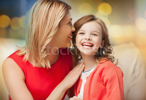 Heureux mère fille chuchotement oreille famille [[stock_photo]] © dolgachov