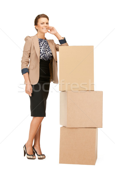 Stock photo: attractive businesswoman with big boxes
