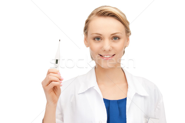 Stock photo: attractive female doctor with thermometer