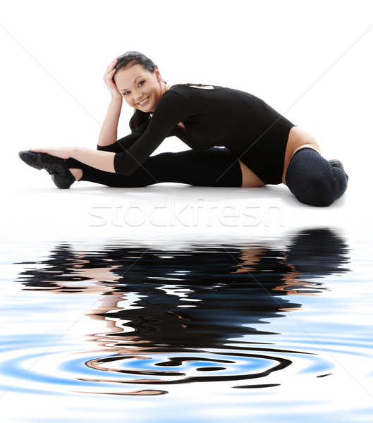 fitness black leotard on white sand #4 Stock photo © dolgachov