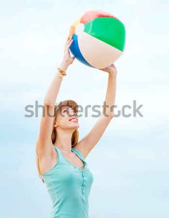 happy woman with yellow sarong on the beach Stock photo © dolgachov