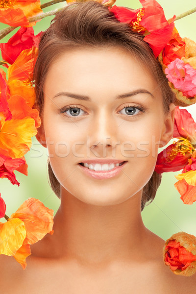 Frau roten Blumen Bild Blumen Gesicht glücklich Stock foto © dolgachov