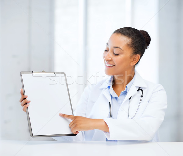 doctor with blank prescription Stock photo © dolgachov