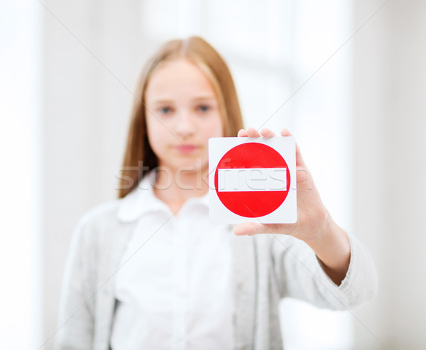 girl showing no entry sign Stock photo © dolgachov