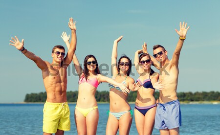 Grup gülen plaj yaz tatili tatil Stok fotoğraf © dolgachov