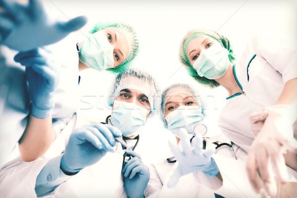 Groupe médecins salle d'opération photos jeunes équipe [[stock_photo]] © dolgachov