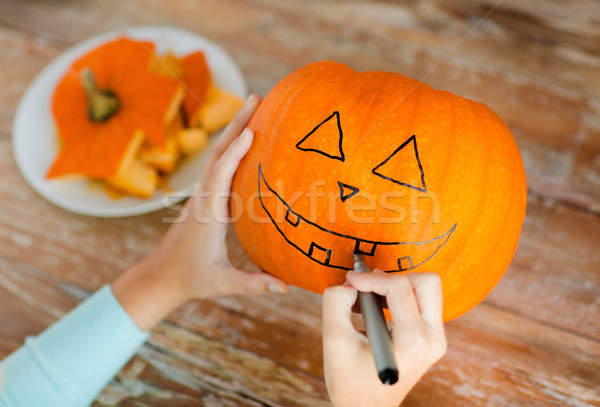 close up of woman with pumpkins at home Stock photo © dolgachov