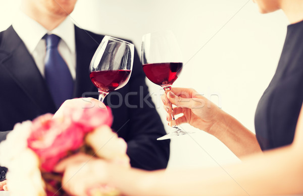 engaged couple with wine glasses Stock photo © dolgachov