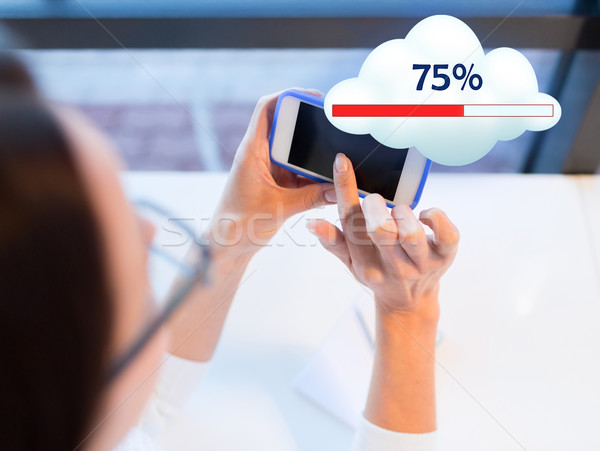 Stock photo: close up of woman with smartphone cloud computing