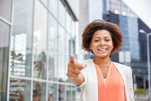 happy young african american businesswoman in city Stock photo © dolgachov