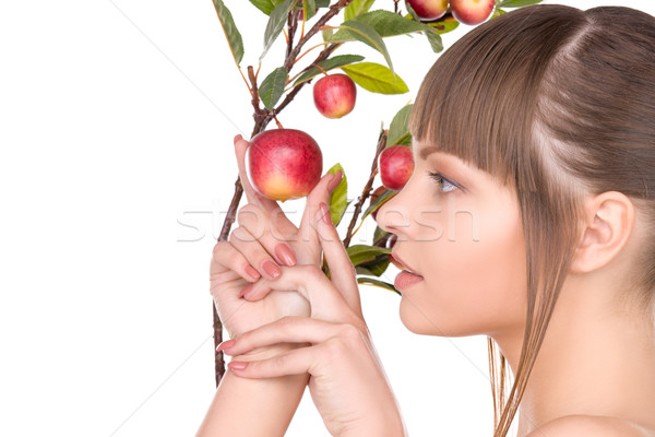lovely woman with apple twig Stock photo © dolgachov