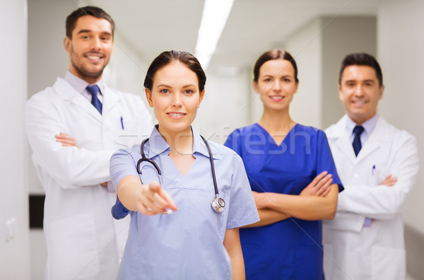 Groupe pointant doigt hôpital clinique profession [[stock_photo]] © dolgachov