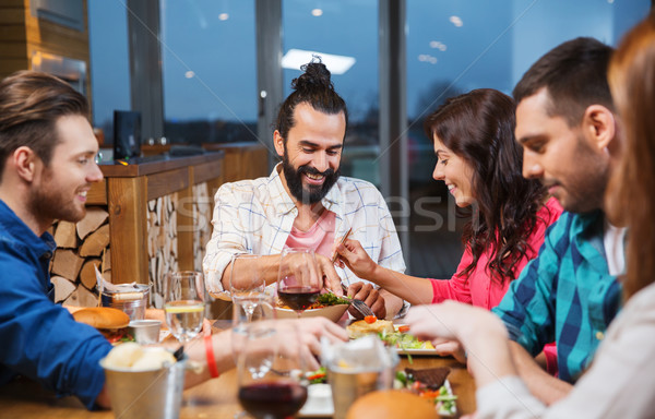 Foto stock: Amigos · comer · degustación · alimentos · restaurante · ocio