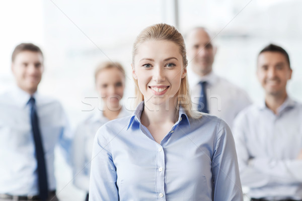 Souriant femme d'affaires collègues bureau gens d'affaires travail d'équipe [[stock_photo]] © dolgachov