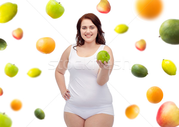 happy plus size woman in underwear with apple Stock photo © dolgachov