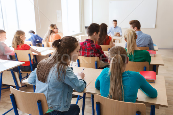 Stock photo: group of students writing school test