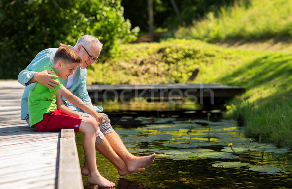 [[stock_photo]]: Grand-père · petit-fils · séance · rivière · famille · génération