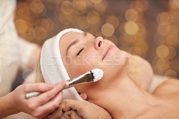 close up of young woman and cosmetologist in spa Stock photo © dolgachov