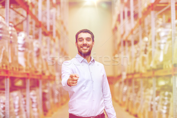 happy man at warehouse Stock photo © dolgachov