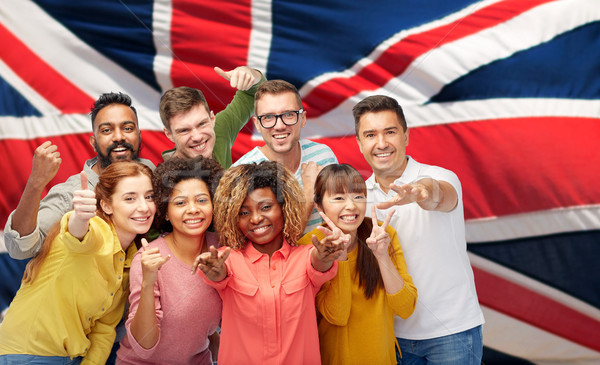 international people gesturing over british flag Stock photo © dolgachov