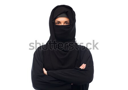 muslim woman in hijab over white background Stock photo © dolgachov