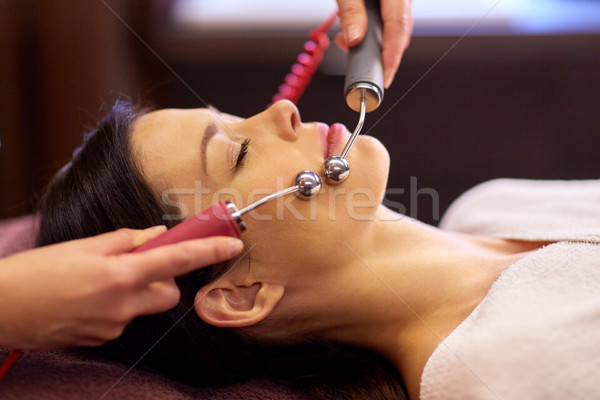 woman having hydradermie facial treatment in spa Stock photo © dolgachov